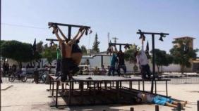 Convert or die. ISIS militants are crucifying victims because to them crucifixion is especially humiliating due to its Christian implications.